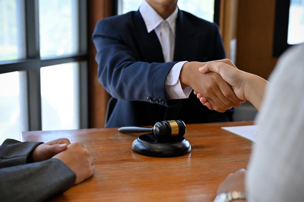 Legal consulting services, legal negotiations, Lawyers are signing legal contract agreement documents.